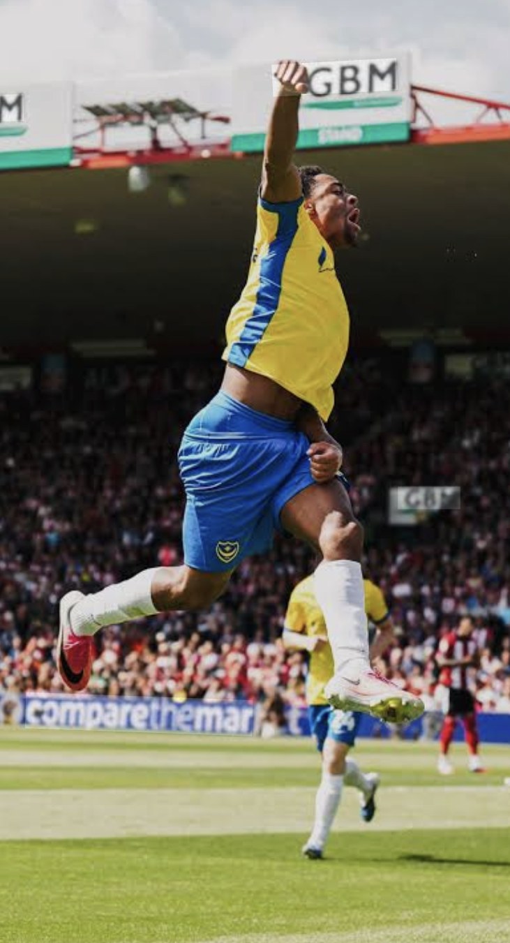 Ryan Kavuma-McQueen flies away in celebration for Portsmouth